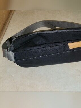 Bellroy Black Sling Belt Bag with Tan Leather Tab